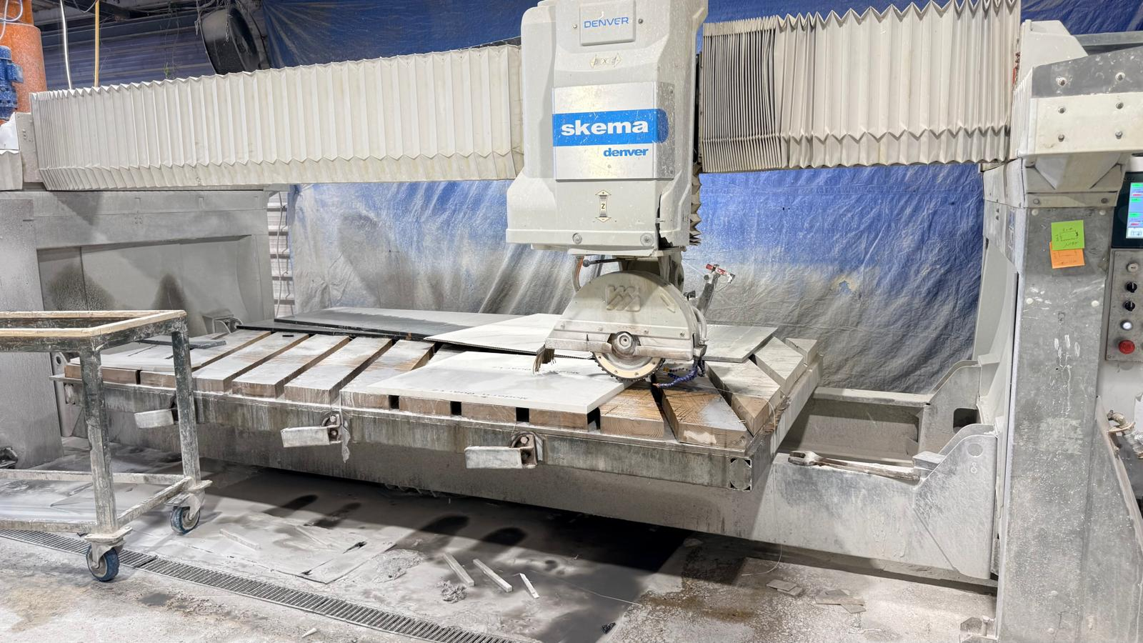 MonoLux CNC fabrication cutting a quartz worktop slab after templating for UK installation.