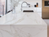 gold oives quartz kitchen island